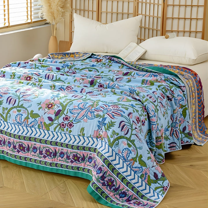 Blue Blossom Vintage Floral Jacquard Bedspread seen from the foot of a bed