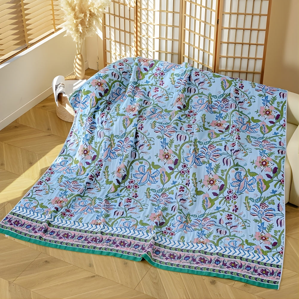 Blue Blossom Vintage Floral Jacquard Bedspread folded on a bed