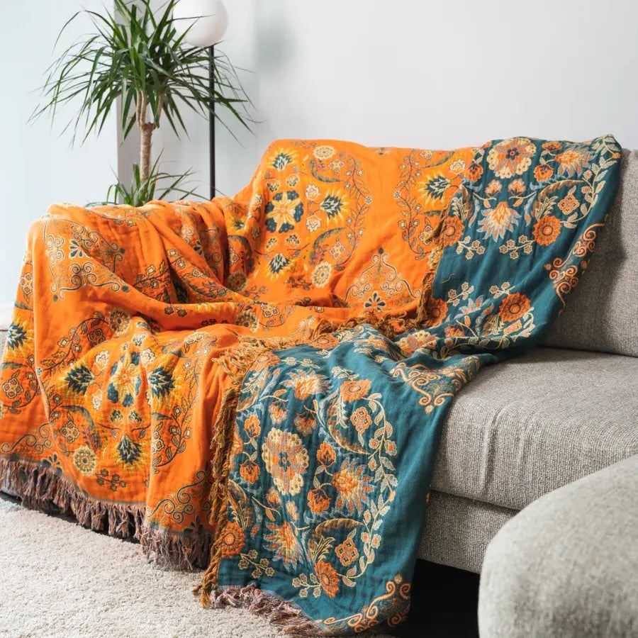 Vintage Marigold Cotton Gauze Throw draped across a couch