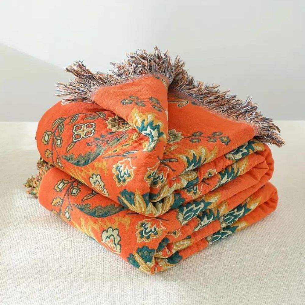 Vintage Marigold Cotton Gauze Throw folded with fringe showing