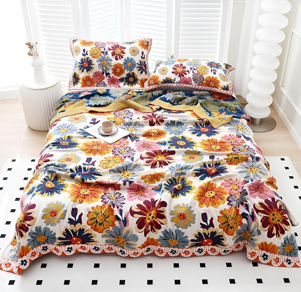 Vivid Floral Reversible Cotton Throw on a full bed