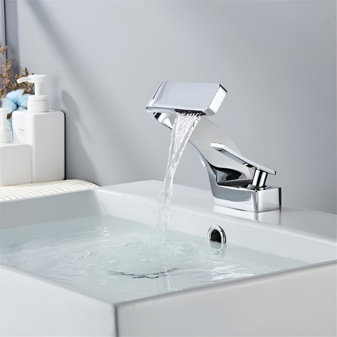 Waterfall Brass Bathroom Faucet installed on vanity lifestyle