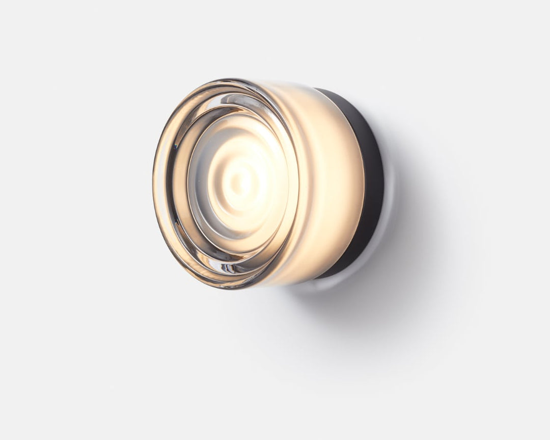Wave-Textured Glass Sconce lit glow detail