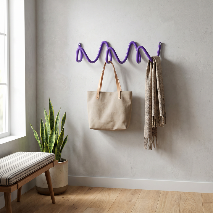 Purple Wavy Iron Wall Coat Hooks in hallway with tote bag