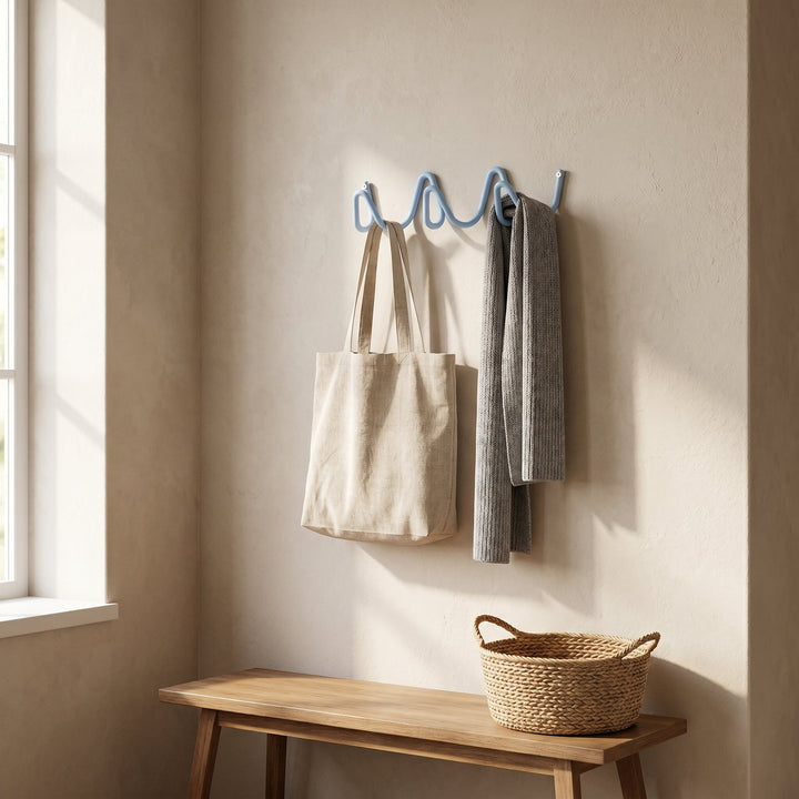Blue Wavy Iron Wall Coat Hooks in entryway with bag and scarf