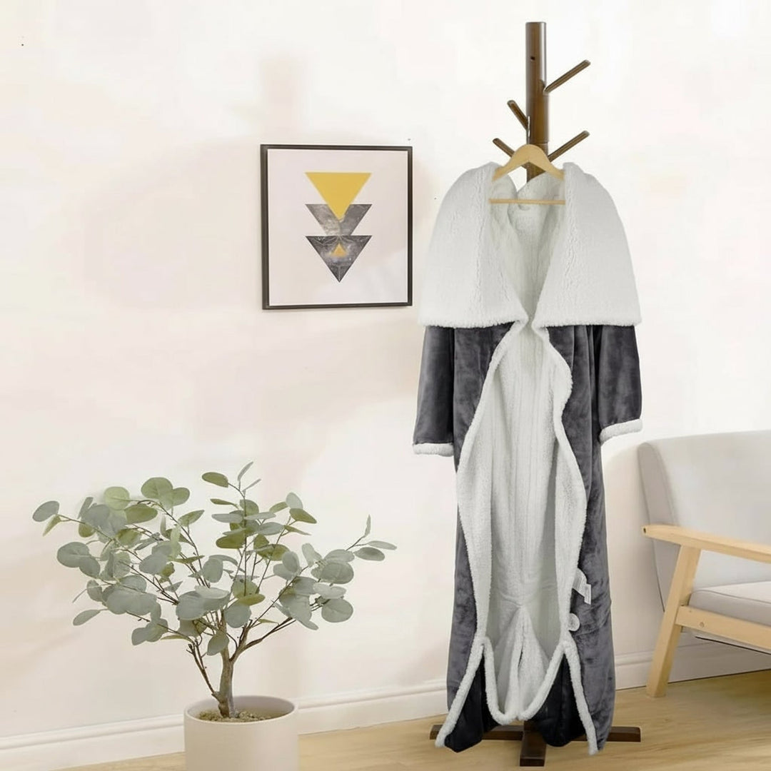 Wearable heated blanket hung on a stand