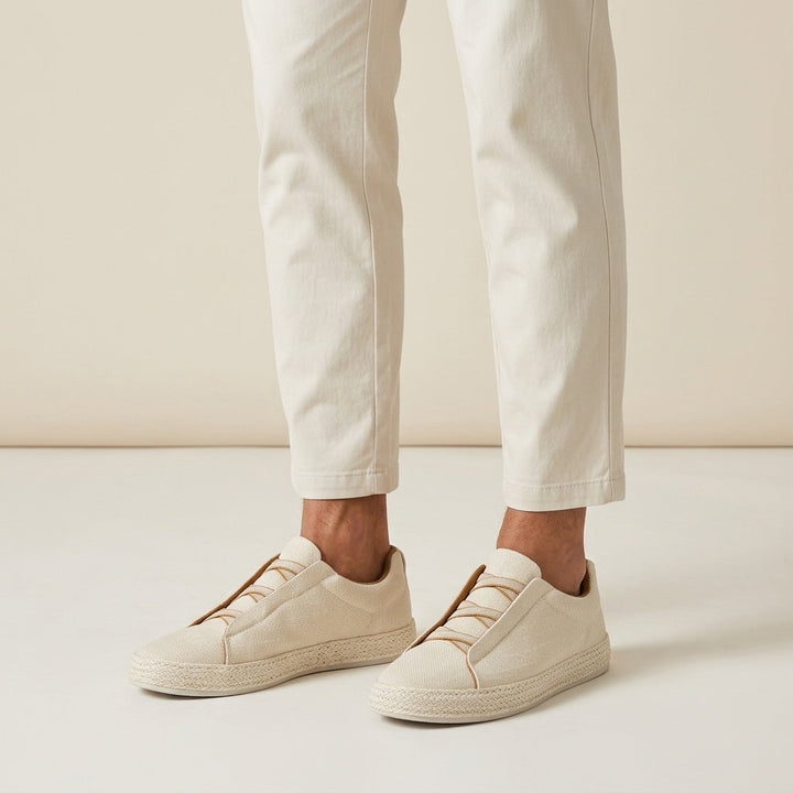 Cream Woven Slip-On Sneakers worn with white trousers