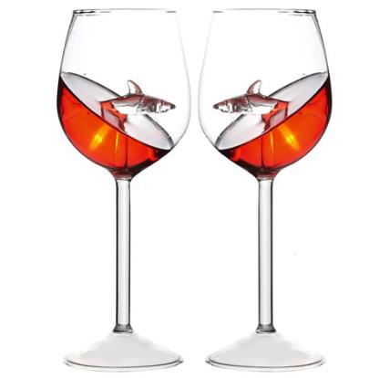 Lead-Free Crystal Shark Wine Glasses pair tilted with red wine